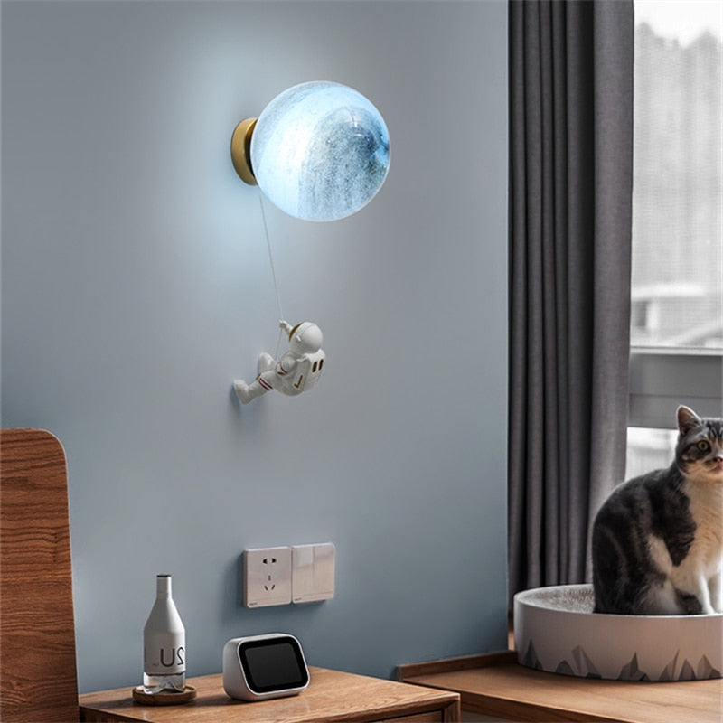 Astronaut Climbing Moon Wall Lamp for space-themed decor2