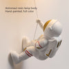 Astronaut Climbing Moon Wall Lamp for space-themed decor9