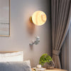 Astronaut Climbing Moon Wall Lamp for space-themed decor0